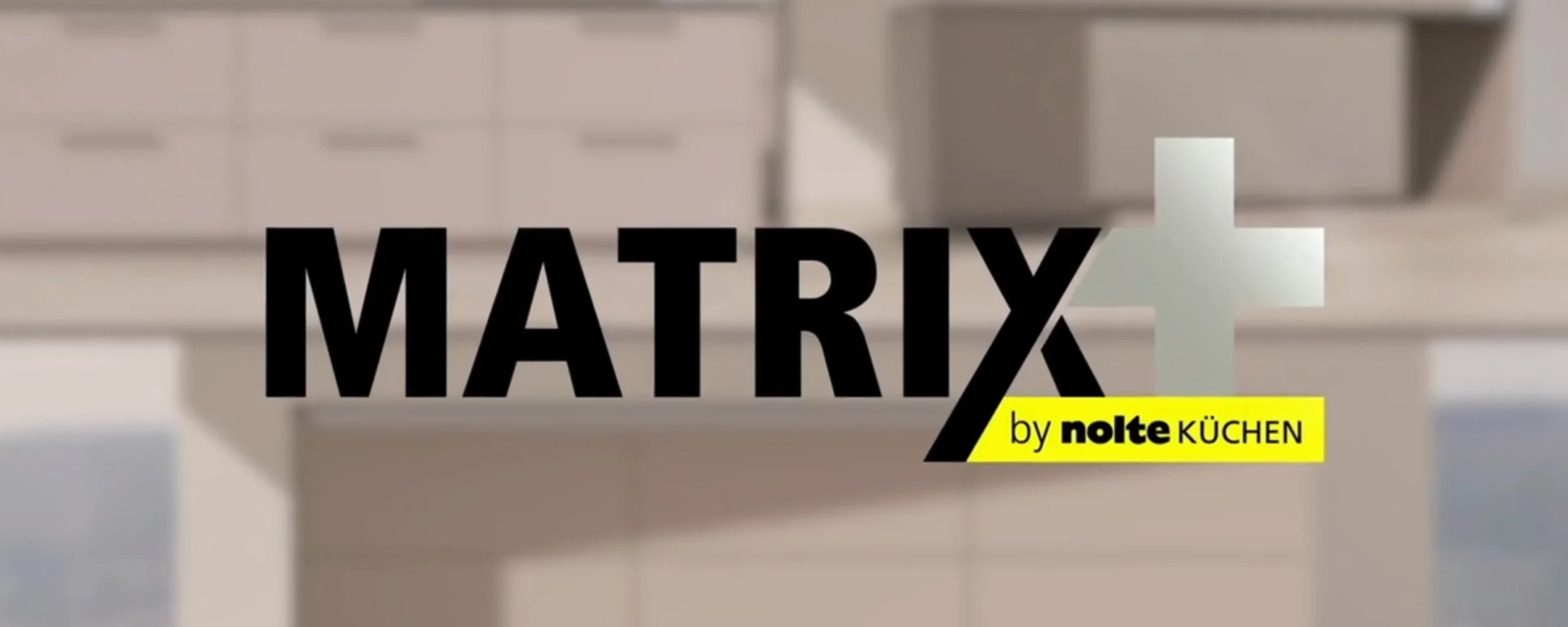 Eine moderne Küche mit Nolte Küchen Logo im Vordergrund.