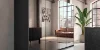 Moderne Loft-Wohnung mit Spiegelwand, grauem Schrank und Ledersofa. nolteneo.