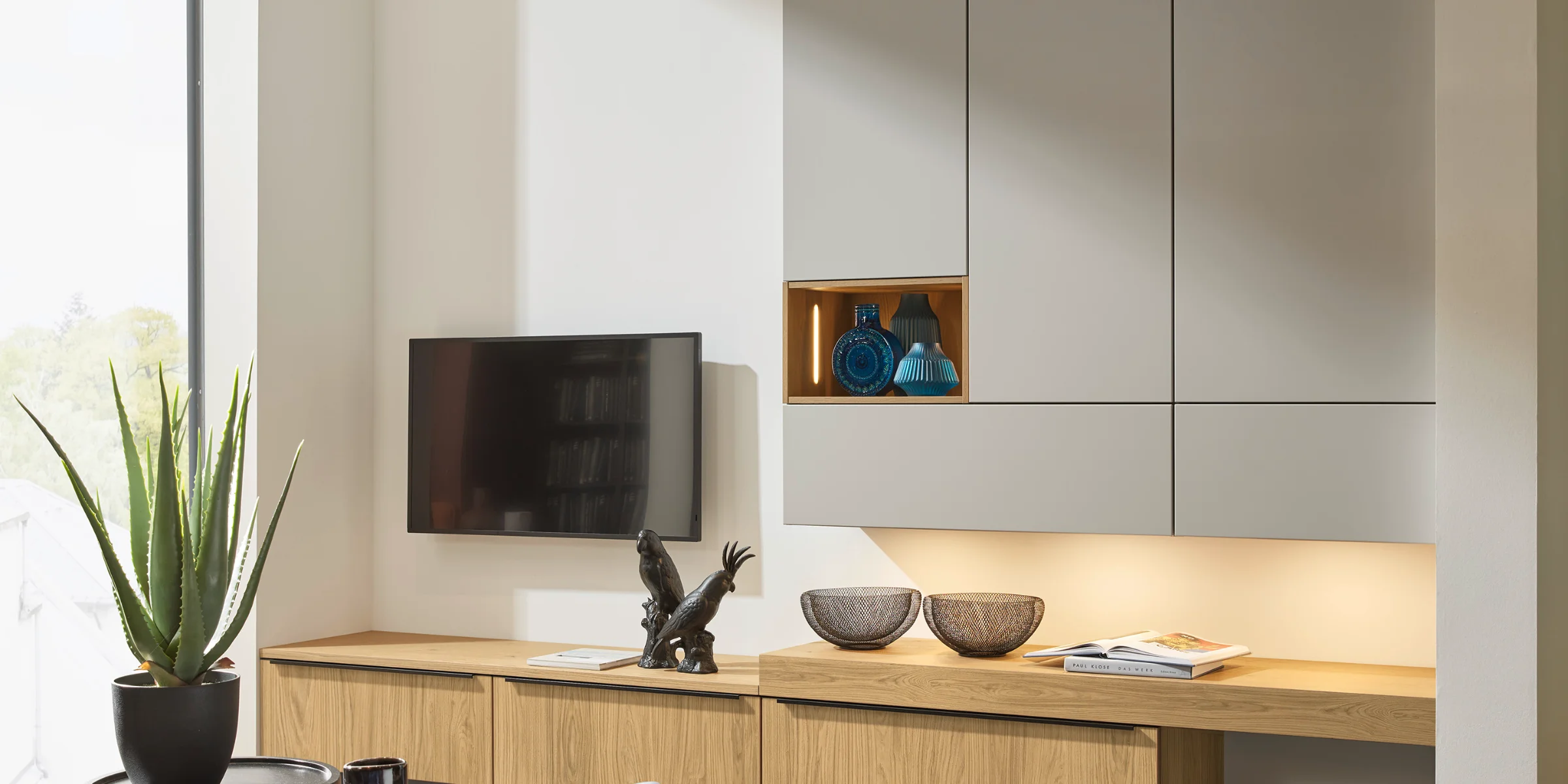 Ein modern eingerichtetes Wohnzimmer mit Nolte Living Möbeln.