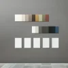 Farbmuster und Türfronten an einer grauen Wand in einem modernen Design, NolteNeo.