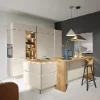 Eine moderne Küche mit Holz- und Weißtönen. Nolte Küchen.