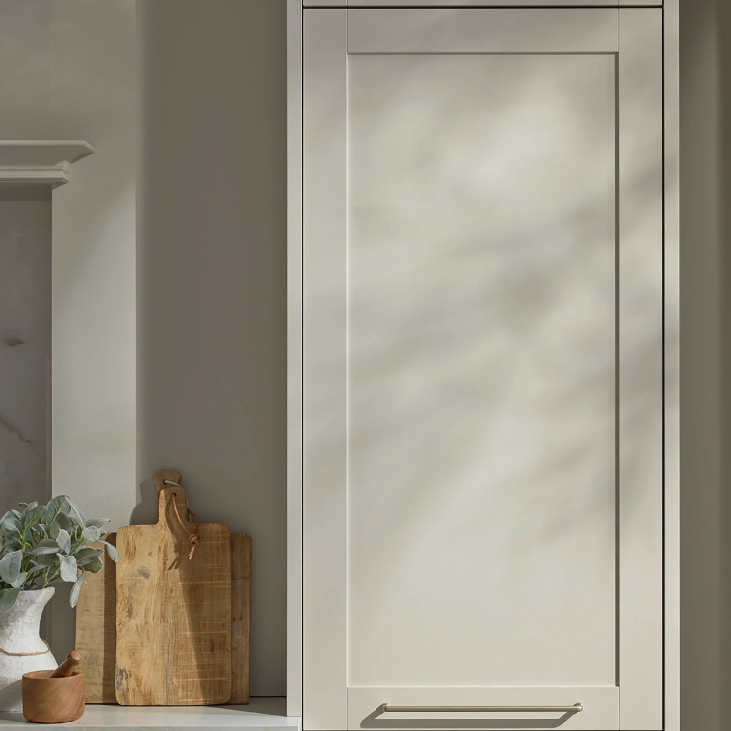 Elegant kitchen cabinet view with wooden board, Nolte Küchen.