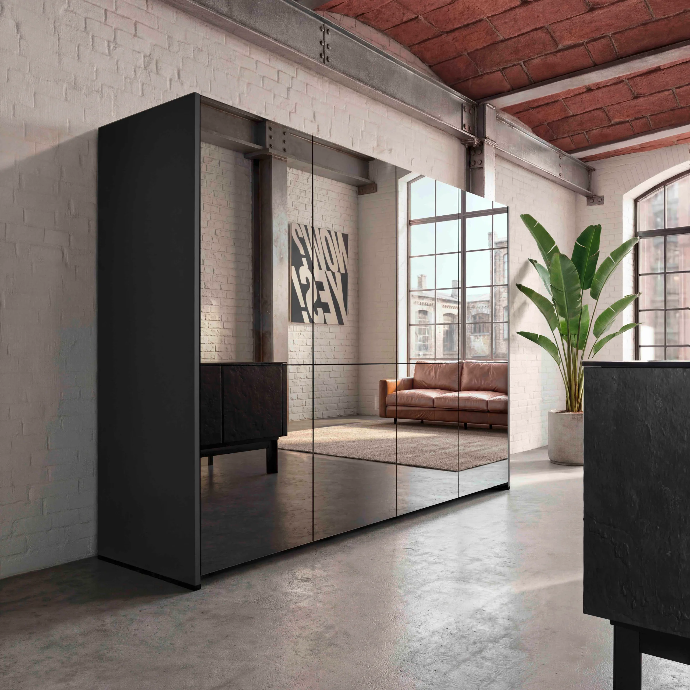 Moderne Loft-Wohnung mit Spiegelwand, grauem Schrank und Ledersofa. nolteneo.