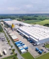 A large industrial hall in a rural setting, Nolte Kitchens.